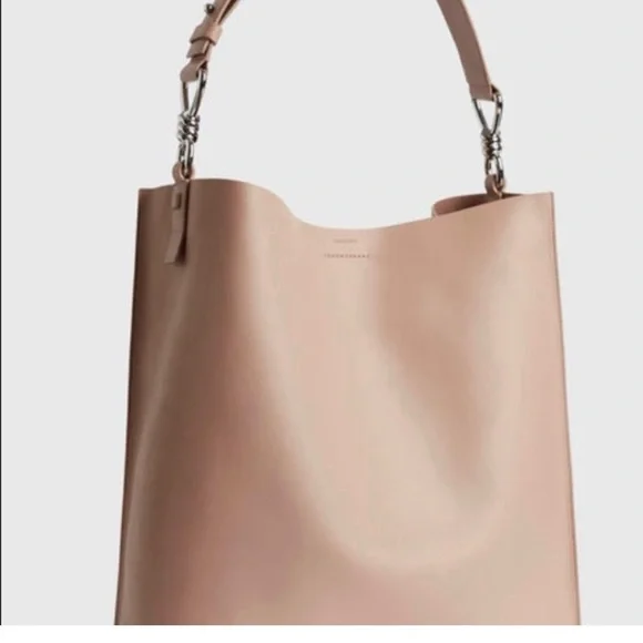 ALLSAINTS CAPTAIN LEATHER NORTH TOTE

SOUTH USED A FEW TIMES JUST LIKE BRAND NEW - Picture 6 of 11